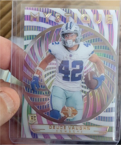 2023 Panini Illusions #8 Deuce Vaughn Mystique — front