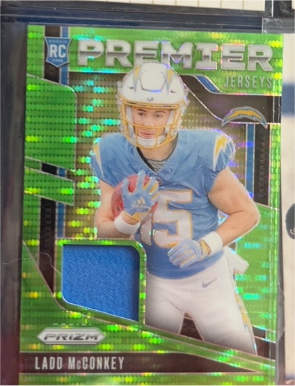 2024 Panini Prizm Premier Jerseys #PJ-LMY Ladd McConkey — front