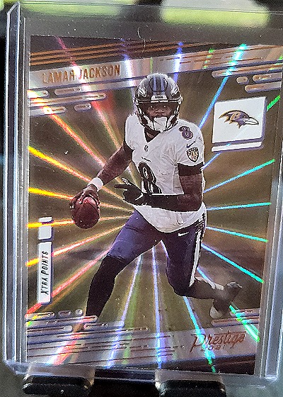 2021 Panini Prestige #22 Lamar Jackson Xtra Points Sunburst — front