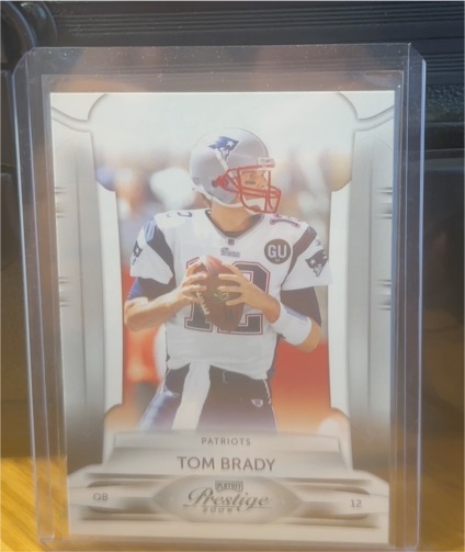 2009 Playoff Prestige #57 Tom Brady — front