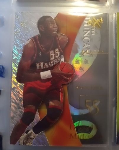1999-00 Skybox E-X #49 Dikembe Mutombo — front
