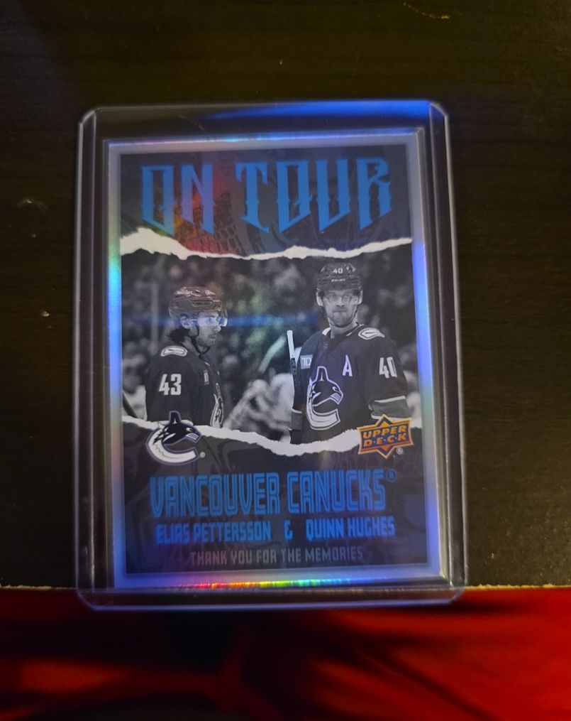 2024-25 Upper Deck Series 2 On Tour #OT-26 Elias Pettersson / Quinn Hughes — front