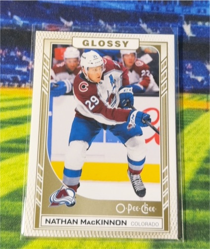 2023-24 Upper Deck Series 2 O-Pee-Chee Glossy #R-36 Nathan MacKinnon — front