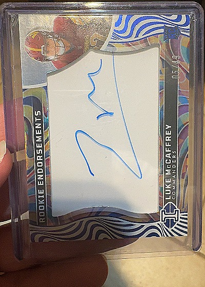 2024 Panini Illusions Rookie Endorsements #RE-LMC Luke McCaffrey — front