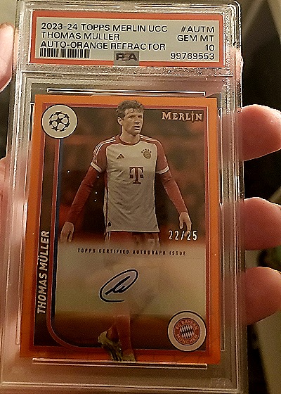 2023-24 Topps Merlin UCC Thomas Muller Auto-Orange Refractor — front