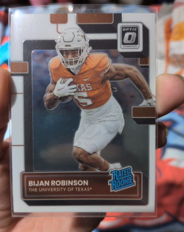 2023 Panini Chronicles Draft Picks Donruss Optic #20 Bijan Robinson Rated Rookie — front