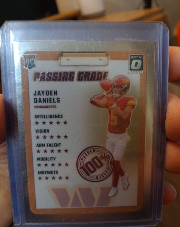 2024 Donruss Optic #2 Jayden Daniels Passing Grade — front