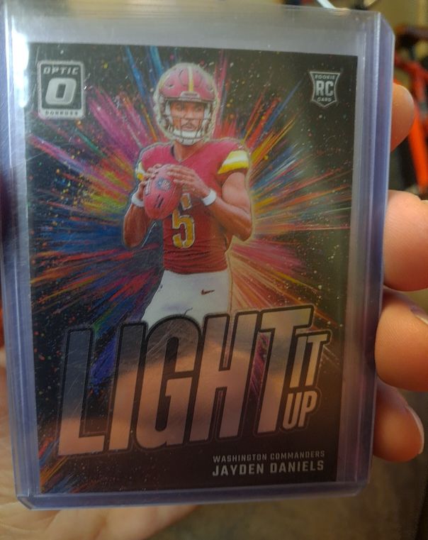 2024 Panini Donruss Optic #8 Jayden Daniels Light It Up — front