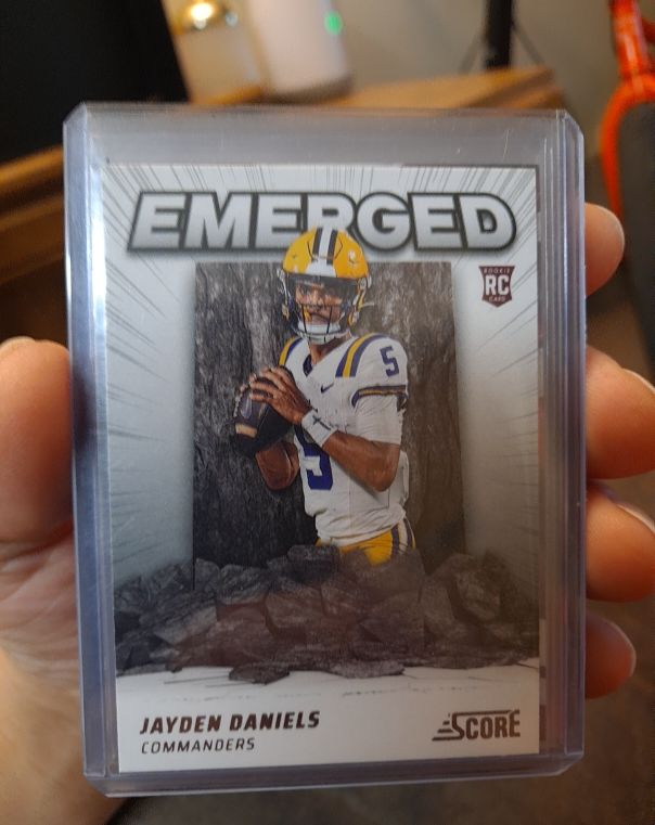 2024 Panini Score Emerged #EM-JDS Jayden Daniels — front