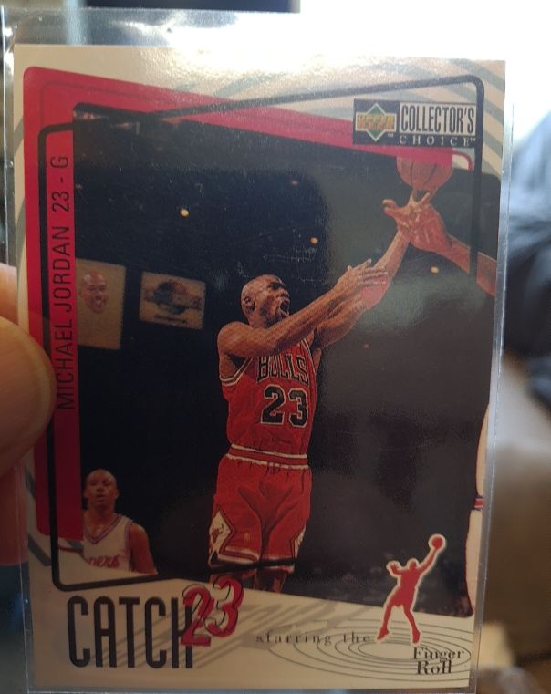 1997-98 Upper Deck Collector's Choice #187 Michael Jordan Catch 23 Finger Roll — front
