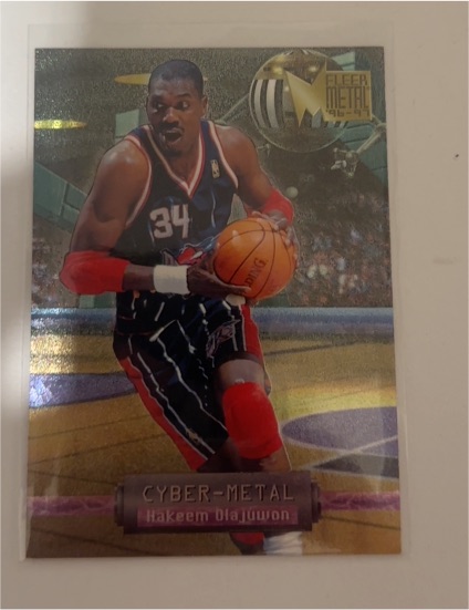 1996-97 Fleer Metal Cyber-Metal #12 Hakeem Olajuwon — front