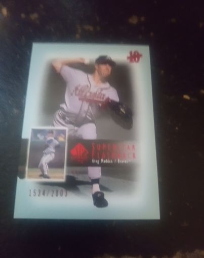 2003 Upper Deck SP Authentic Superstar Flashback #SF7 Greg Maddux — front