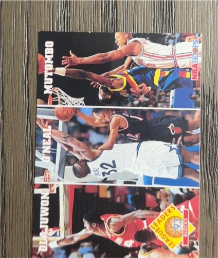 1993-94 Hoops #290 Blocks Hakeem Olajuwon / Shaquille O'Neal / Dikembe Mutombo — front
