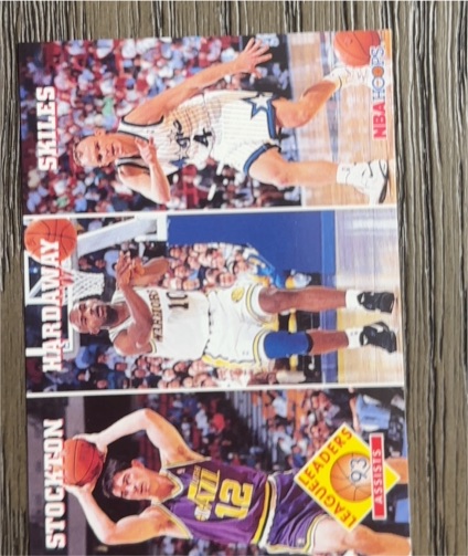1993-94 Hoops #286 John Stockton/Tim Hardaway/Scott Skiles League Leaders Assists — front