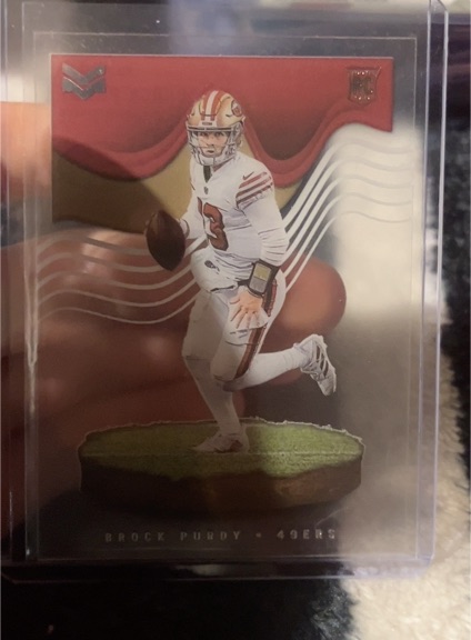 2022 Panini Chronicles Magnitude #MAG-27 Brock Purdy Rookie — front