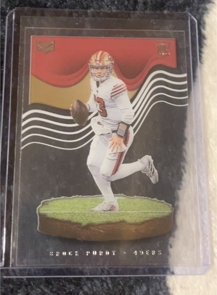 2022 Panini Chronicles Magnitude #MAG-27 Brock Purdy Rookie Card — front