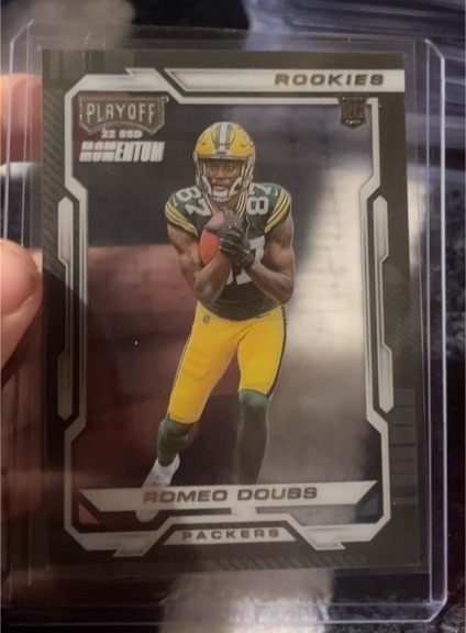 2022 Panini Chronicles Playoff Momentum Rookies #PMR-31 Romeo Doubs — front