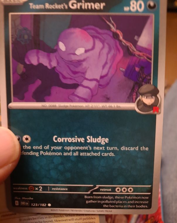2015 Pokémon Team Rocket's Grimer #123 — front