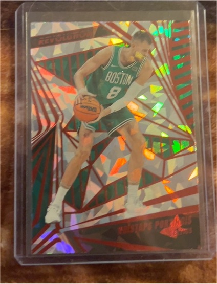 2023-24 Panini Revolution #16 Kristaps Porzingis — front