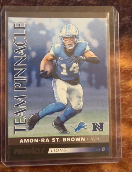 2024 Panini Encore Team Pinnacle #8 Amon-Ra St. Brown — front