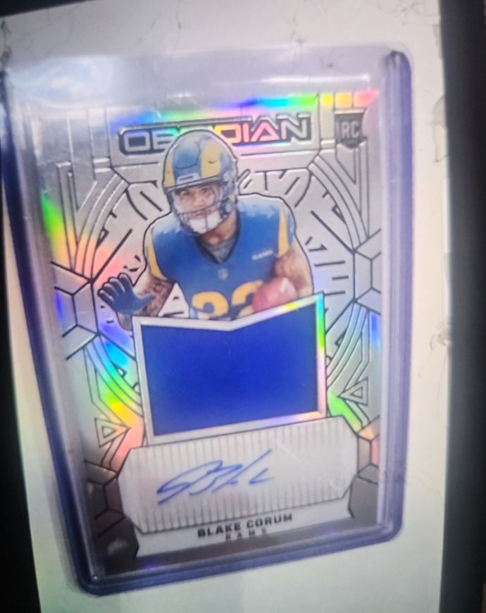 2024 Panini Obsidian #RJJ-BCM Blake Corum Rookie Patch Auto — front