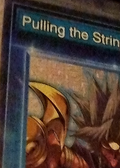 1996 Yu-Gi-Oh! Pulling the Strings — front