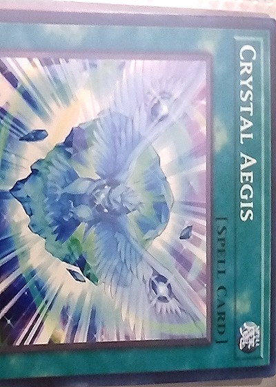 Yu-Gi-Oh! Crystal Aegis Spell Card — front
