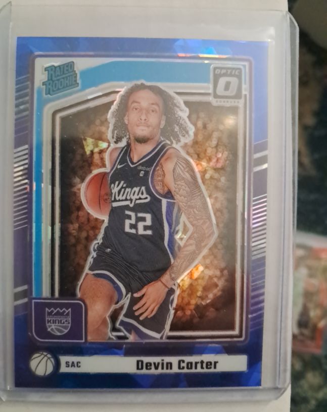 2024-25 Panini Donruss Optic #P-210 Devin Carter Rated Rookie Blue Cracked Ice — front