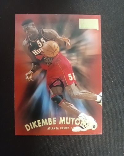 1997-98 SkyBox Premium #74 Dikembe Mutombo — front