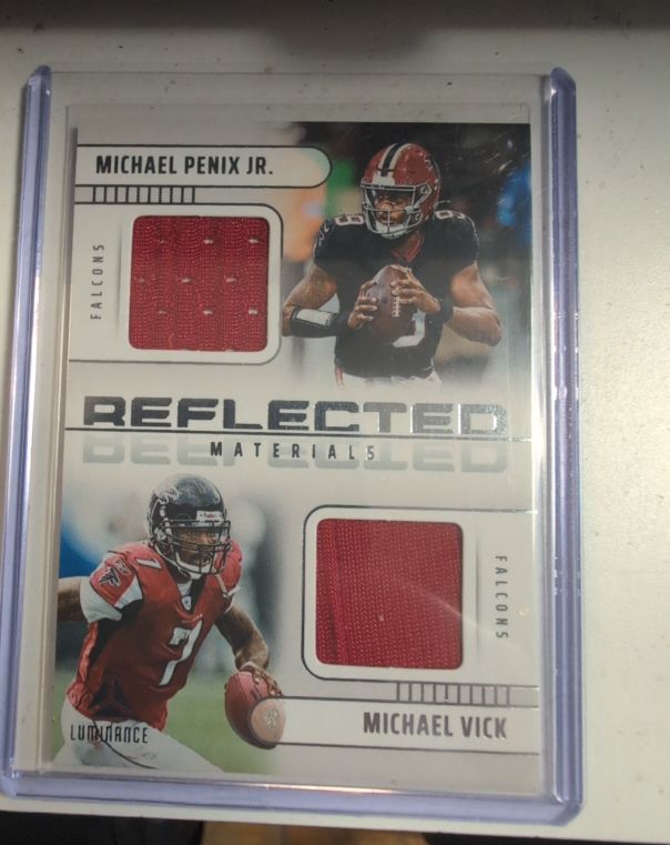 2025 Panini Luminance Reflected Materials #RFM-ATL Michael Penix Jr. / Michael Vick — front