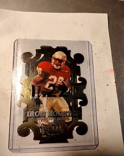 1997 Skybox Metal Universe Iron Rookies #12 Warrick Dunn — front