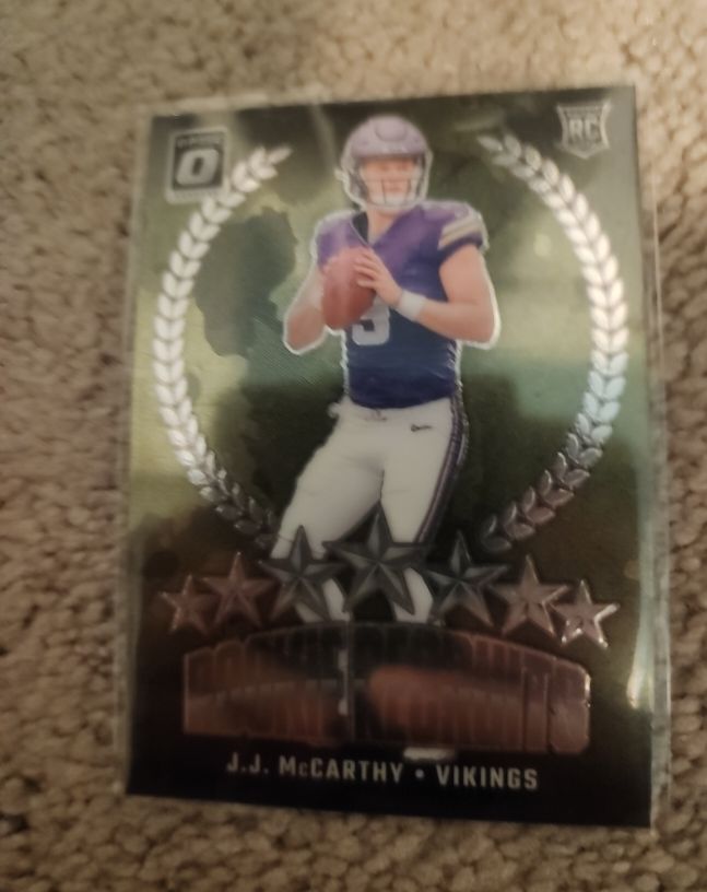 2022 Donruss Optic #RC-1 J.J. McCarthy Rookie Contenders — front