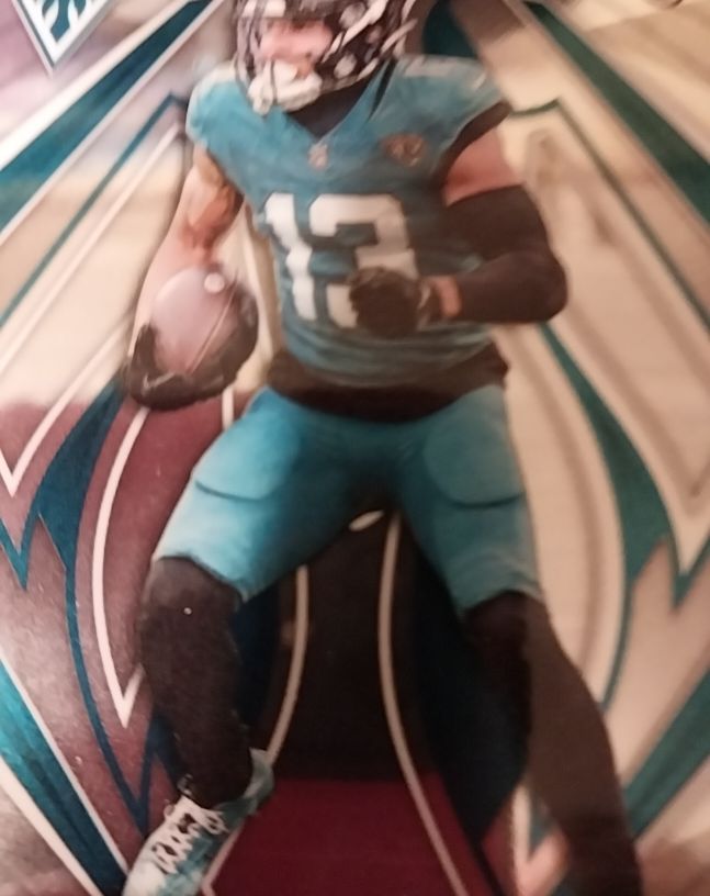 2021 Panini Prizm #13 Travis Etienne Jr. — front