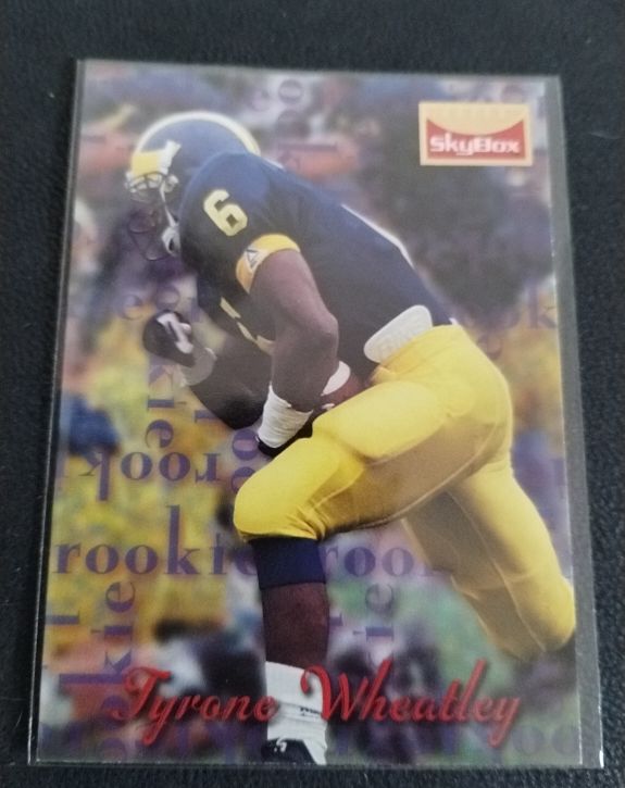 1995 SkyBox Premium #171 Tyrone Wheatley — front