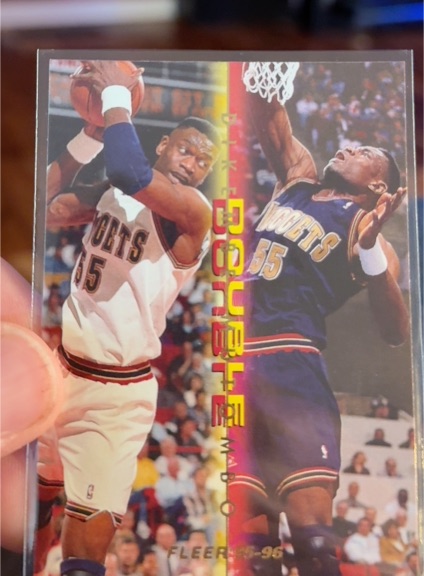 1995-96 Fleer #8 Dikembe Mutombo Double Double — front