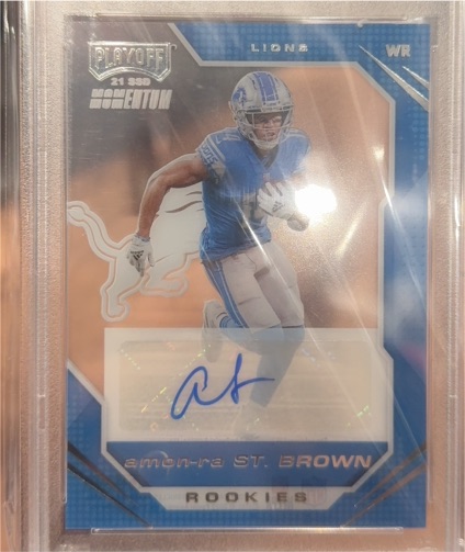 2021 Playoff Momentum #21-399 Amon-Ra St. Brown — front