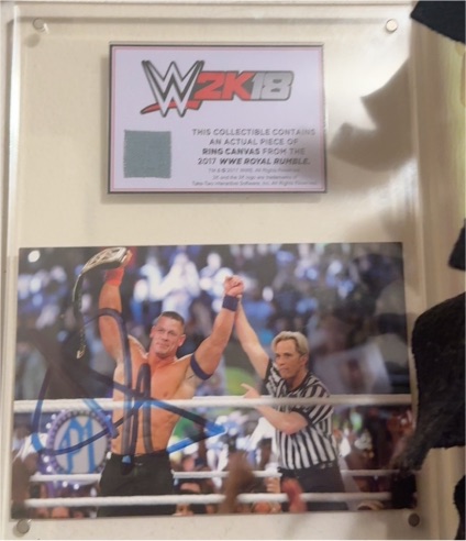 WWE 2K18 2017 Royal Rumble John Cena Autographed Photo and Ring Canvas Piece — front