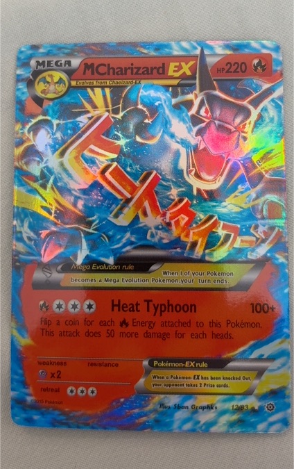 2016 Pokémon Generations #12 M Charizard EX — front