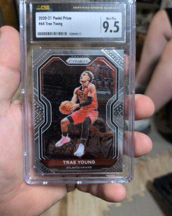 2020-21 Panini Prizm #64 Trae Young — front