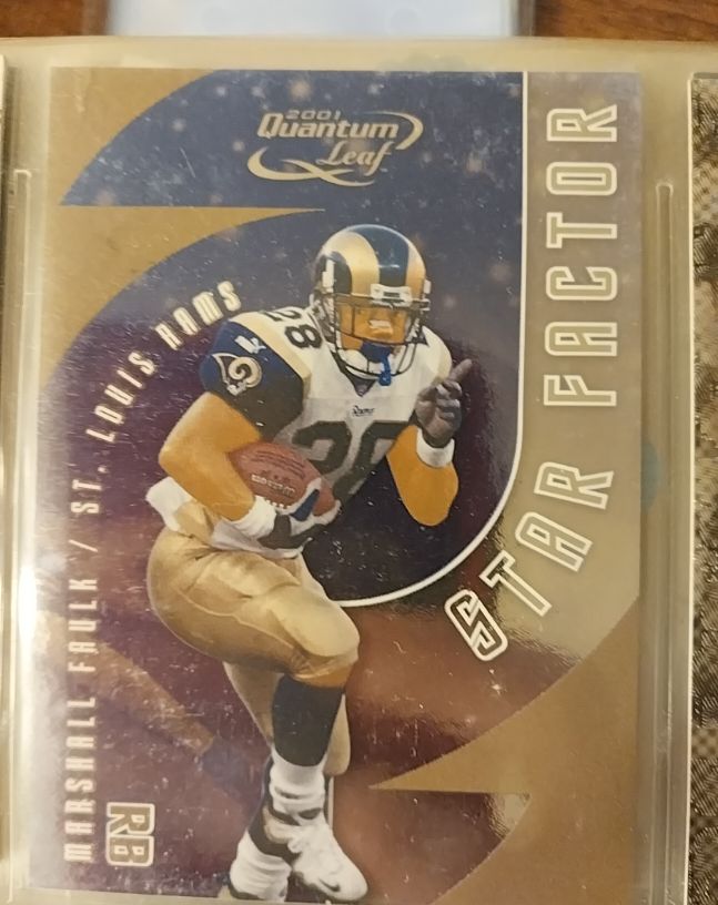 2001 Quantum Leaf Star Factor #SF-28 Marshall Faulk — front