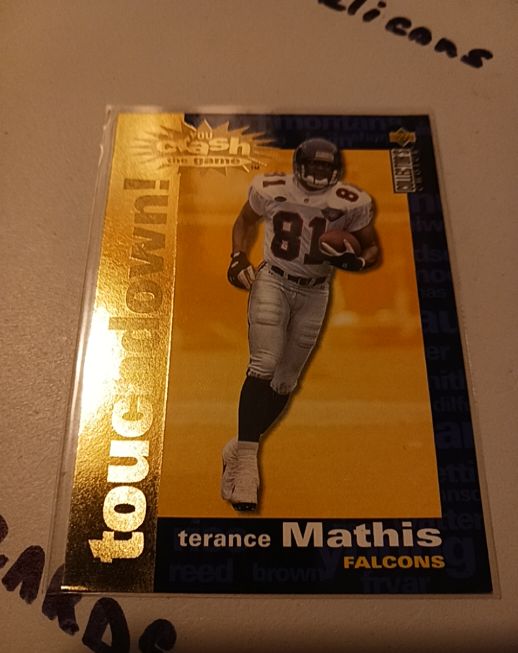 1995 Upper Deck Collector's Choice #C28 Terance Mathis You Crash The Game Gold — front