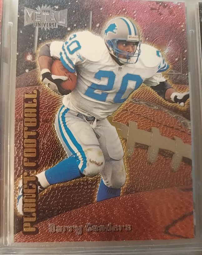 1998 Metal Universe Planet Football #1 Barry Sanders — front