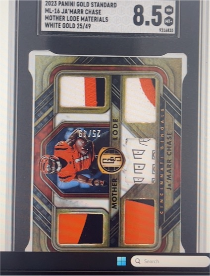 2023 Panini Gold Standard ML-16 Ja'Marr Chase Mother Lode Materials White Gold 25/49 — front