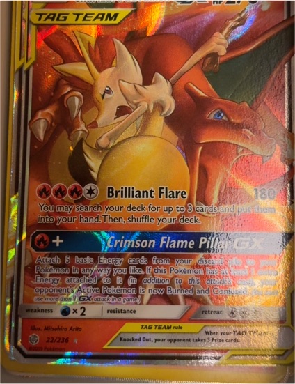 2019 Pokémon Cosmic Eclipse #22 Charizard & Braixen GX — front