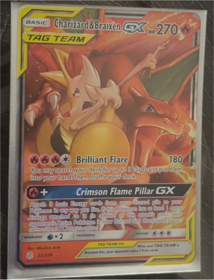 2019 Pokémon Cosmic Eclipse #22 Charizard & Braixen GX — front