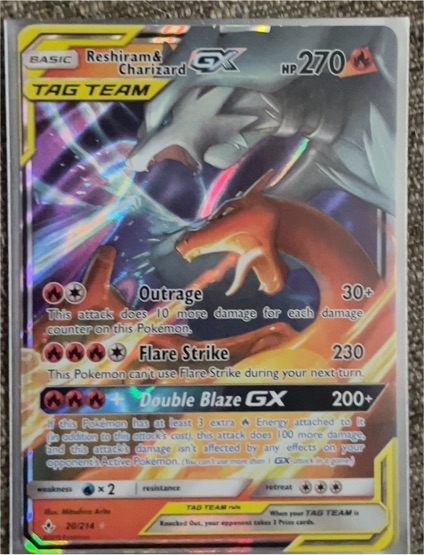 2019 Pokémon TCG Unbroken Bonds #20/214 Reshiram & Charizard GX — front