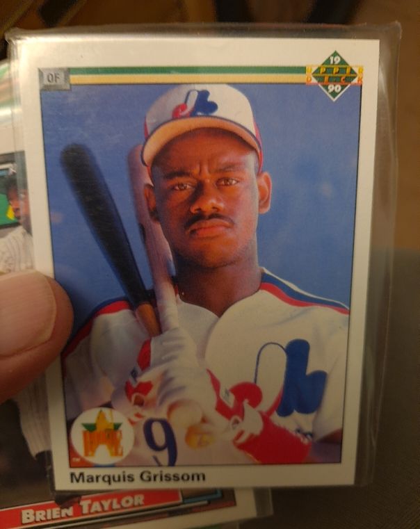 1990 Upper Deck #9 Marquis Grissom — front