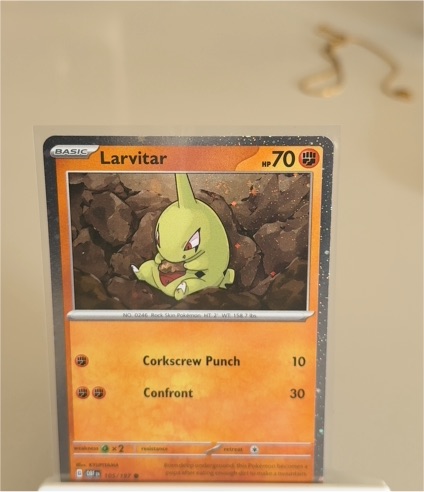 2023 Pokémon SV03: Obsidian Flames #105 Larvitar — front