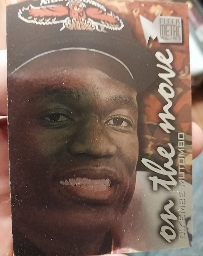1996-97 Fleer Metal #118 Dikembe Mutombo On The Move — front
