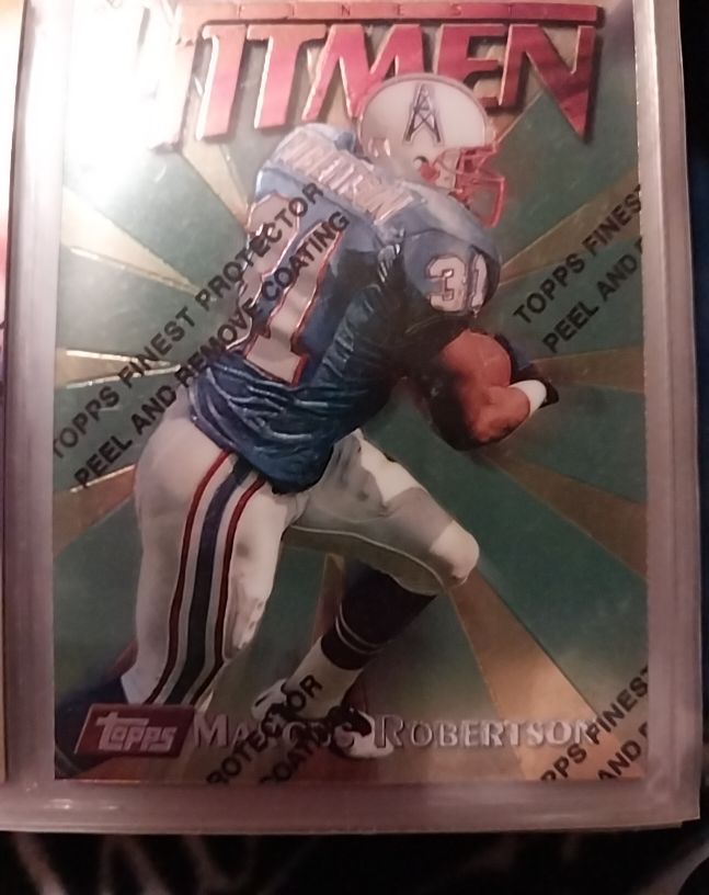 1997 Topps Finest Hitmen #18 Marcus Robertson — front